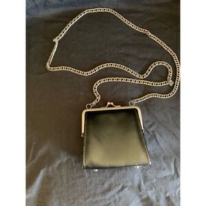 Black Cross Body Purse with  metal strap snap closure sturdy feet bottom